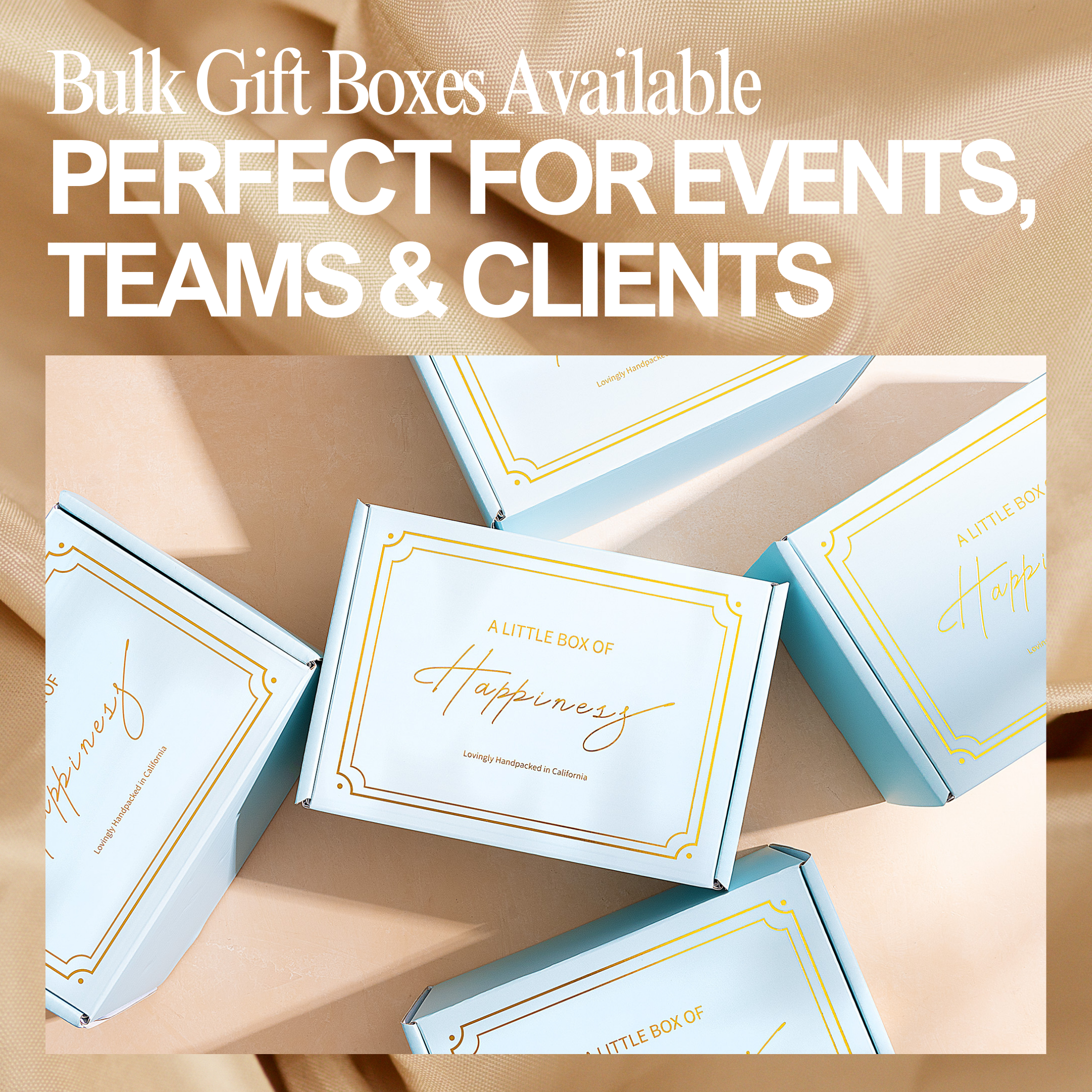 several gift boxes with a gold and white color scheme, arranged on a beige background.