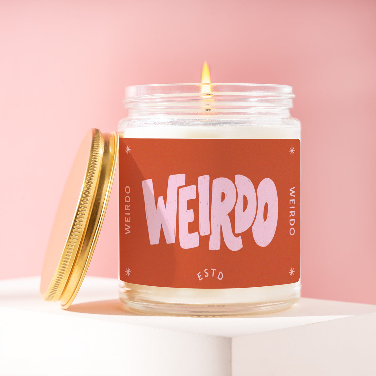 Weirdo 9 oz soy candle with a brushed gold lid by James Wax