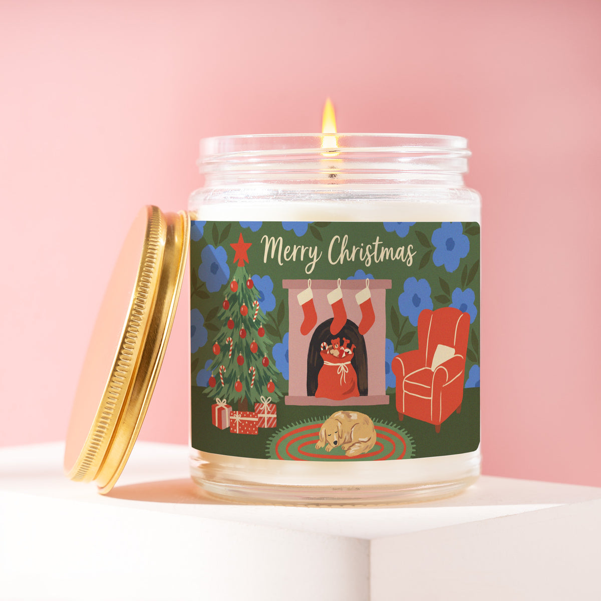 Merry Christmas 9 oz soy candle with a brushed gold lid by James Wax