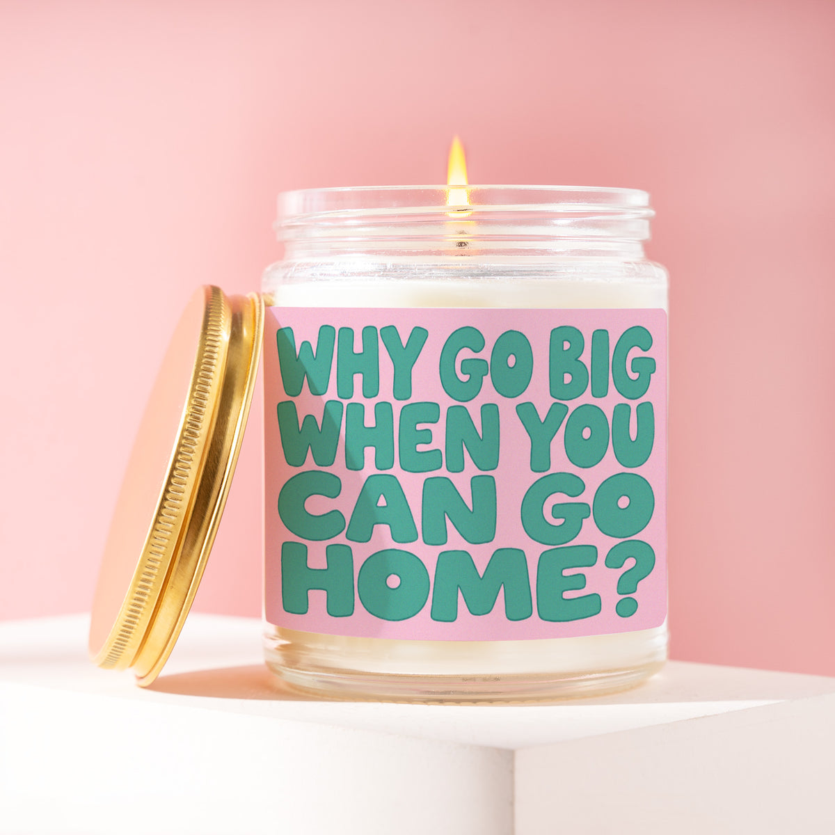 Why Go Big When You Can Go Home? 9 oz soy candle with a brushed gold lid by James Wax