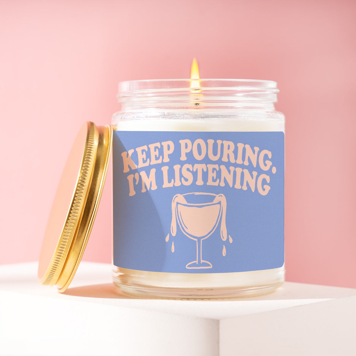 Keep Pouring. I'm Listening. 9 oz soy candle with a brushed gold lid by James Wax