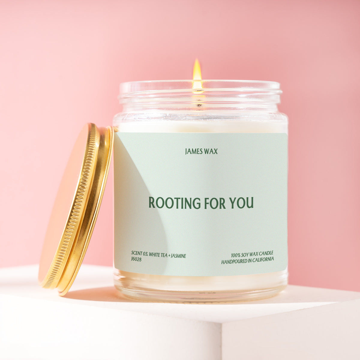 Rooting For You 9 oz soy candle with a brushed gold lid by James Wax