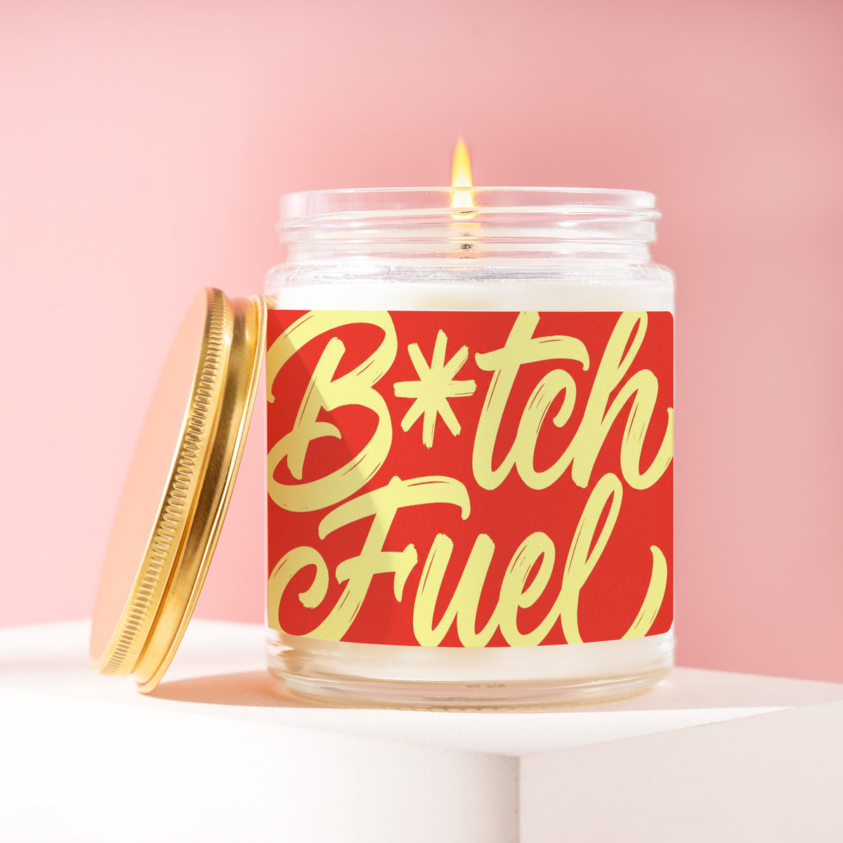 B*tch Fuel 9 oz soy candle with a brushed gold lid by James Wax