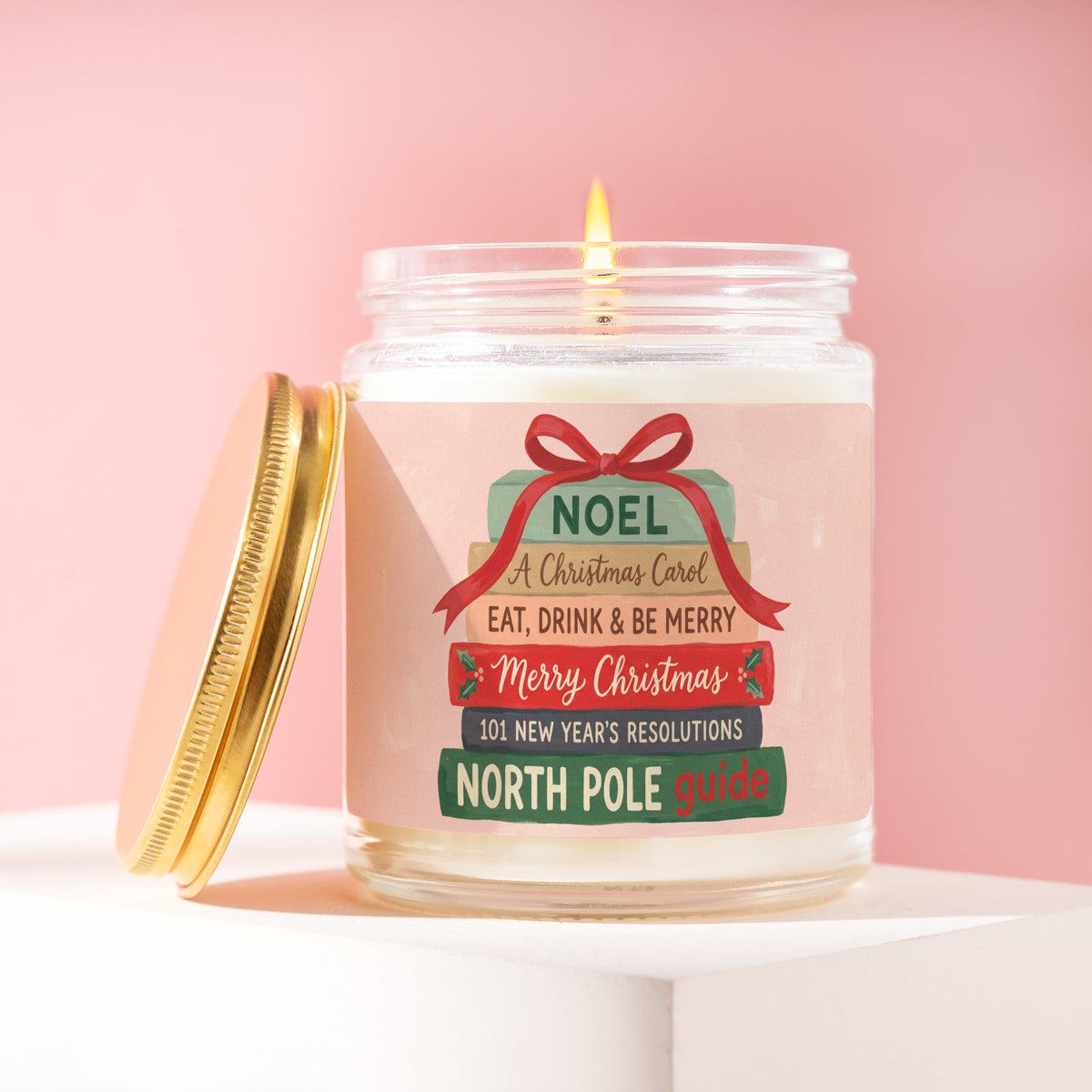Noel, A Christmas Carol, Eat, Drink & Be Merry, Merry Christmas 9 oz soy candle with a brushed gold lid by James Wax
