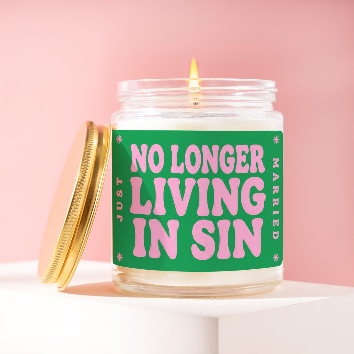No Longer Living In Sin 9 oz soy candle with a brushed gold lid by James Wax