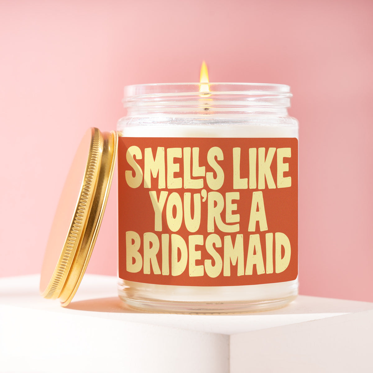 Smells Like You're A Bridesmaid 9 oz soy candle with a brushed gold lid by James Wax