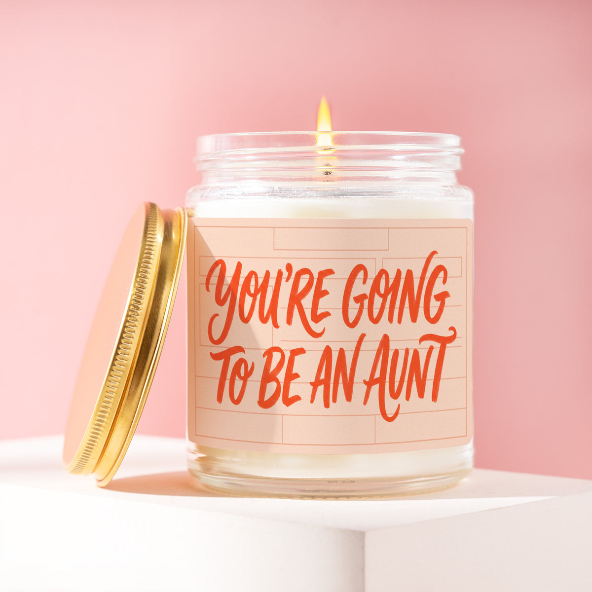 You're Going To Be An Aunt 9 oz soy candle with a brushed gold lid by James Wax
