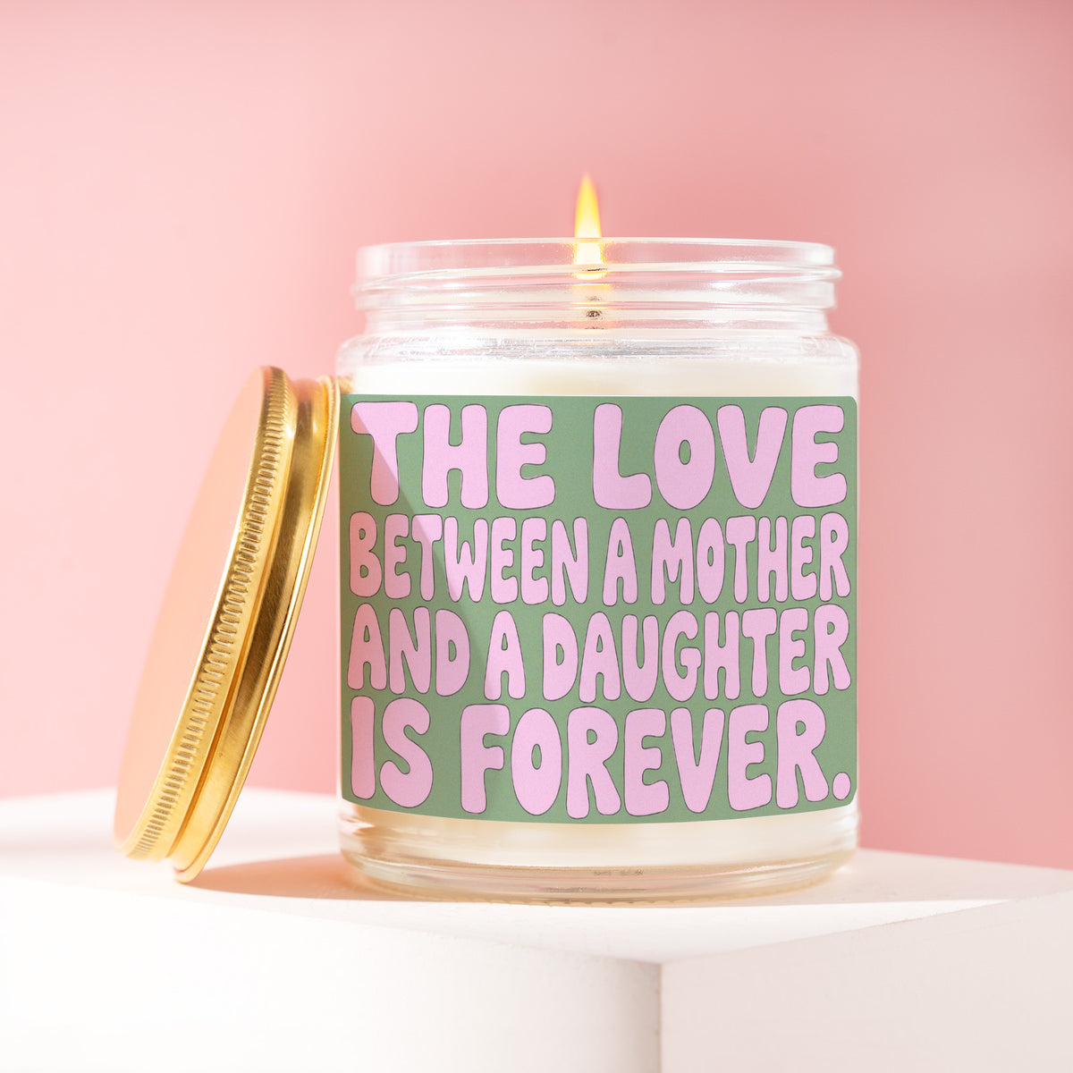 The Love Between A Mother And A Daughter Is Forever. 9 oz soy candle with a brushed gold lid by James Wax