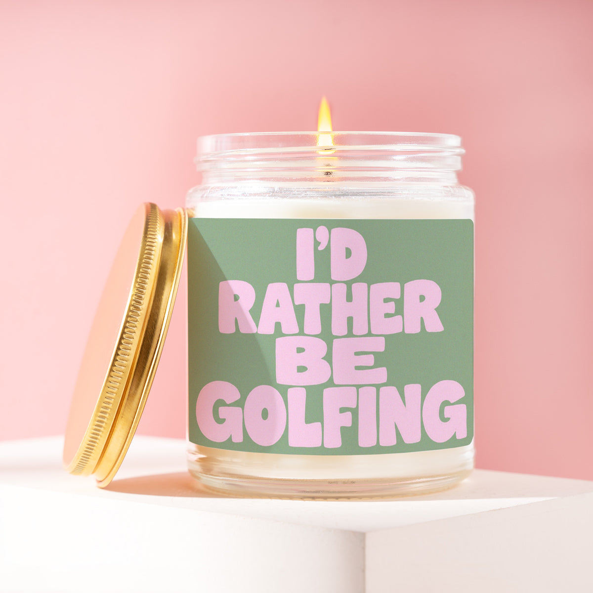 I'd Rather Be Golfing 9 oz soy candle with a brushed gold lid by James Wax