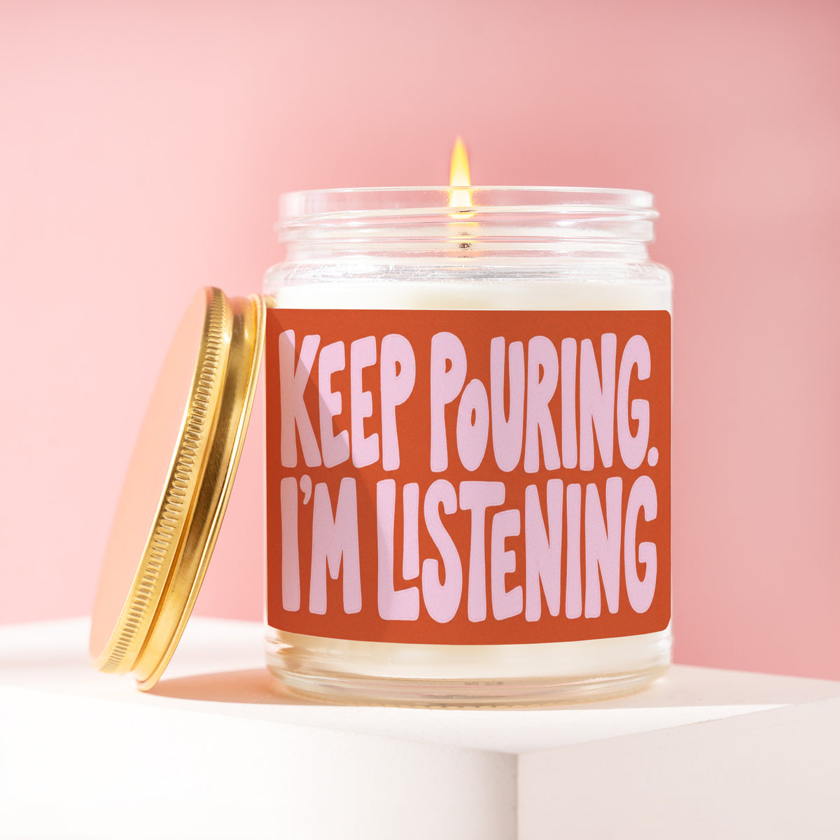 Keep Pouring. I'm Listening. 9 oz soy candle with a brushed gold lid by James Wax