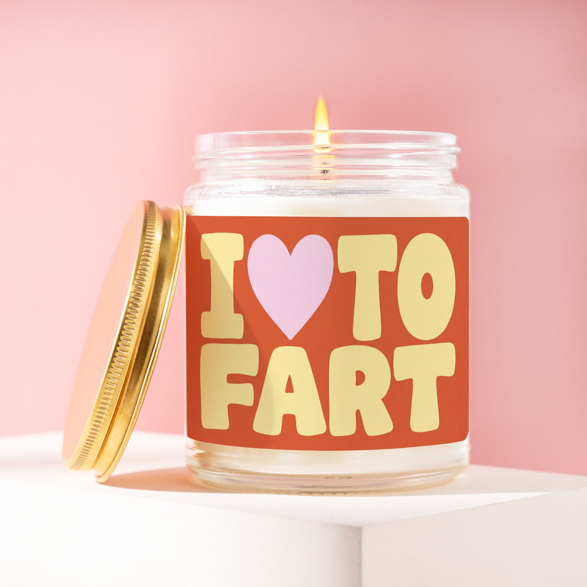 I Heart To Fart 9 oz soy candle with a brushed gold lid by James Wax
