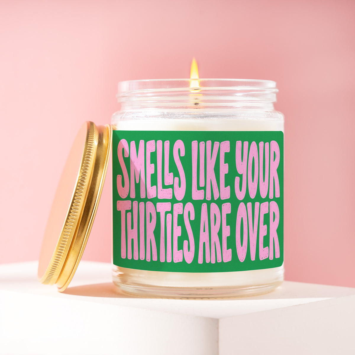 Smells Like Your Thirties Are Over 9 oz soy candle with a brushed gold lid by James Wax