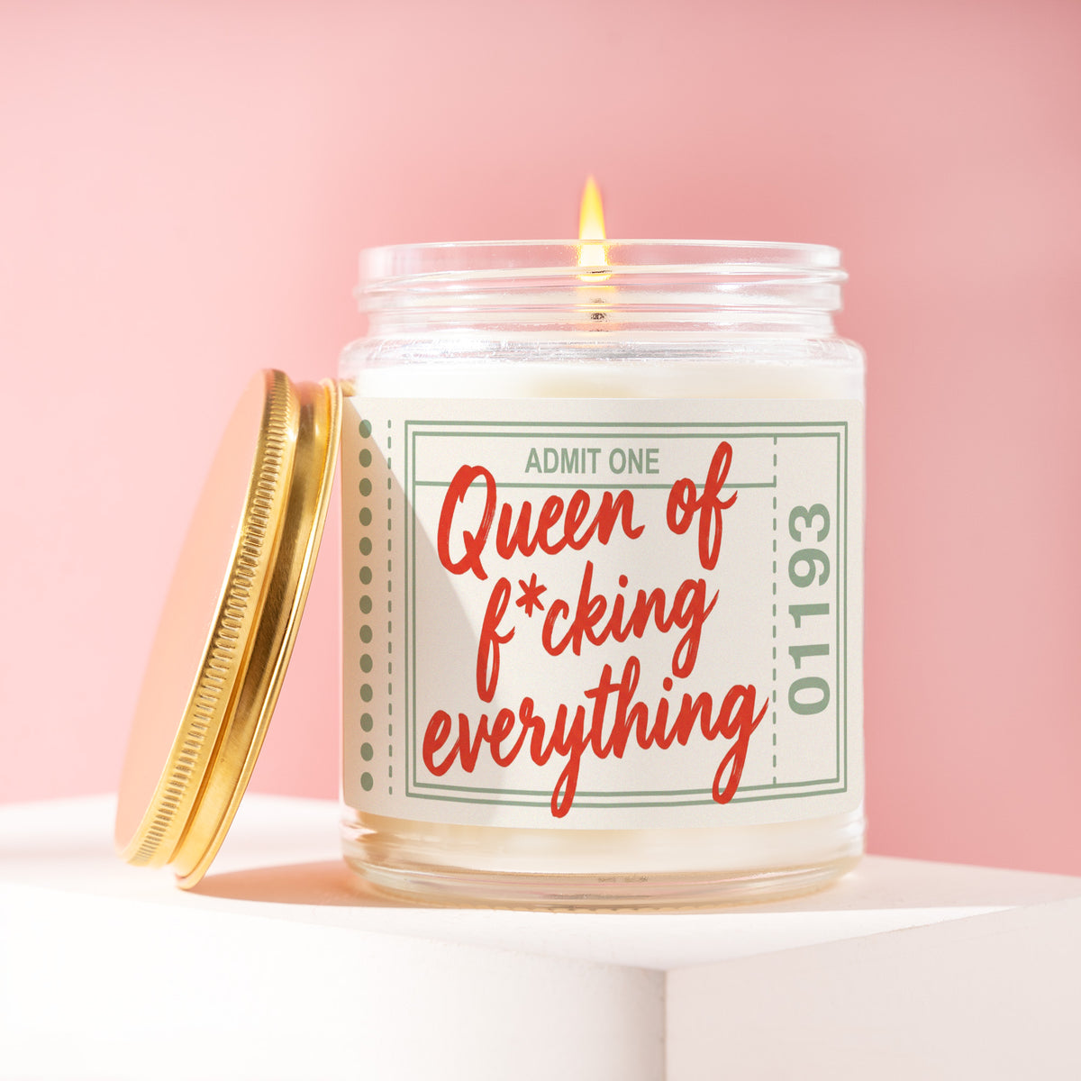 Queen Of F*cking Everything 9 oz soy candle with a brushed gold lid by James Wax