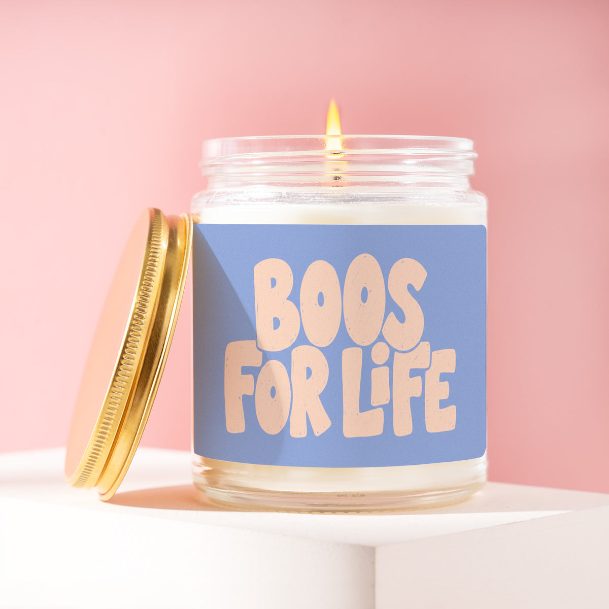Boos For Life 9 oz soy candle with a brushed gold lid by James Wax