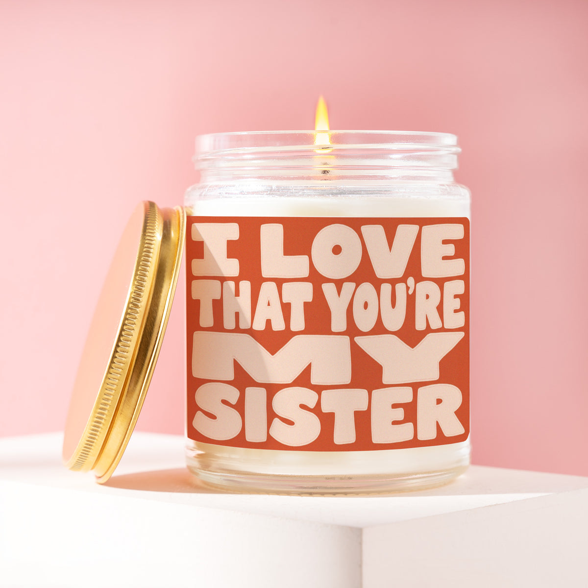 I Love That You're My Sister 9 oz soy candle with a brushed gold lid by James Wax