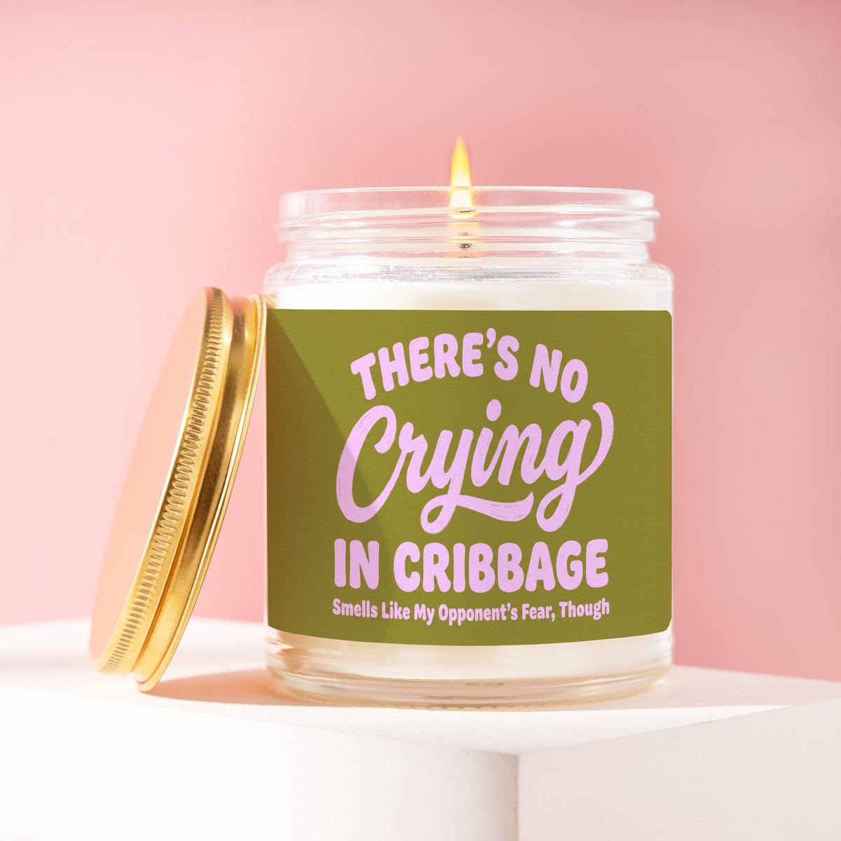 There's No Crying In Cribbage. Smells Like My Opponents' Fear Though 9 oz soy candle with a brushed gold lid by James Wax