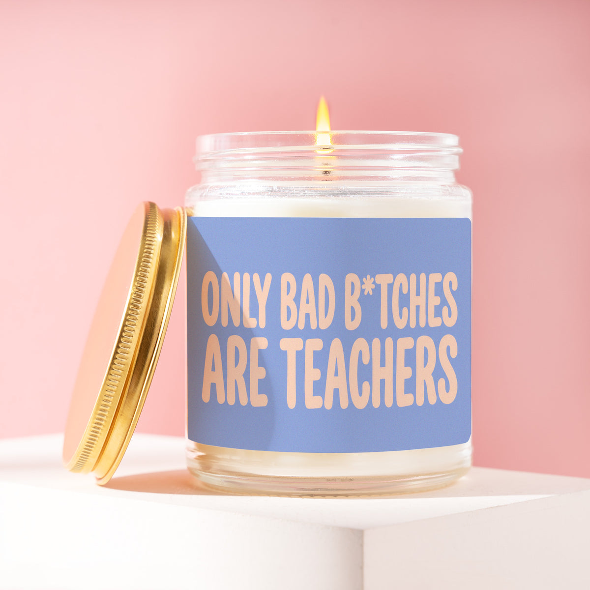 Only Bad B*tches Are Teachers 9 oz soy candle with a brushed gold lid by James Wax