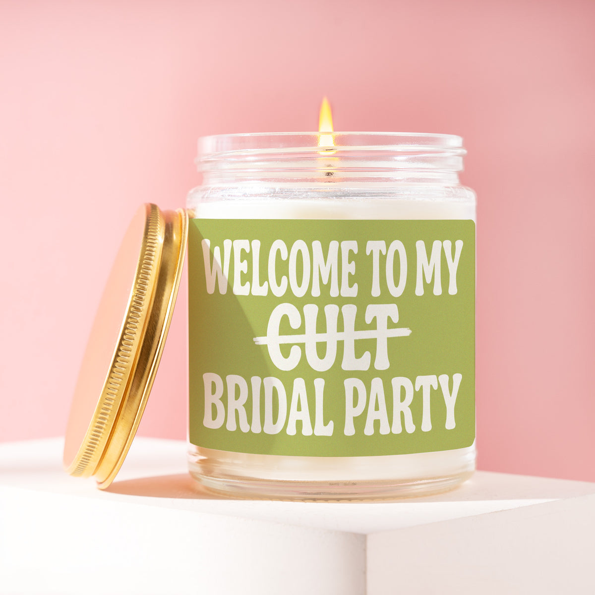 Welcome To My Cult Bridal Party 9 oz soy candle with a brushed gold lid by James Wax