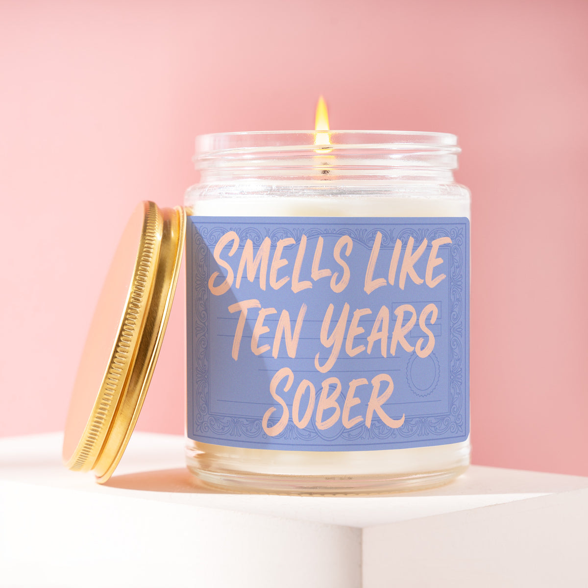 Smells Like Ten Years Sober 9 oz soy candle with a brushed gold lid by James Wax