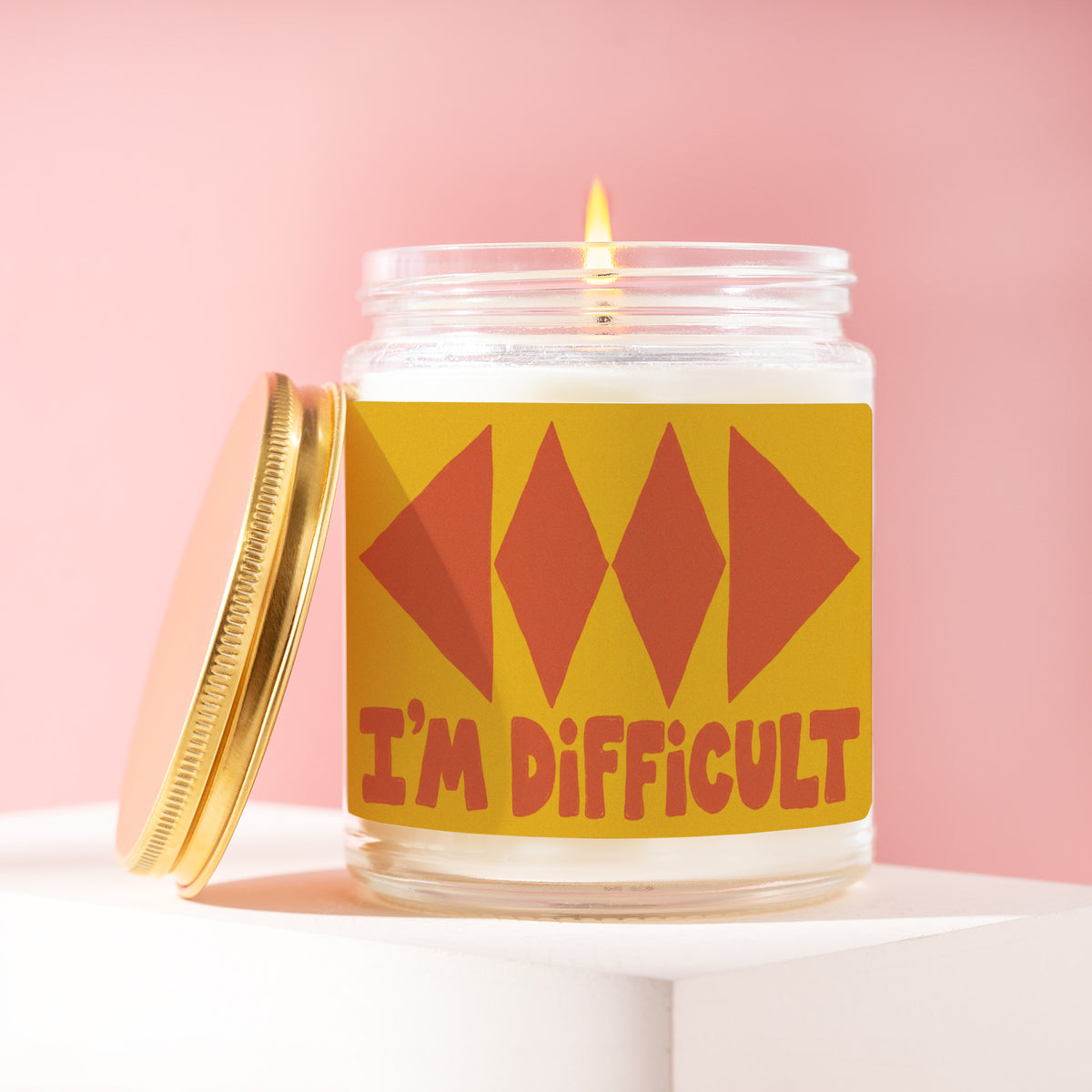 I'm Difficult 9 oz soy candle with a brushed gold lid by James Wax