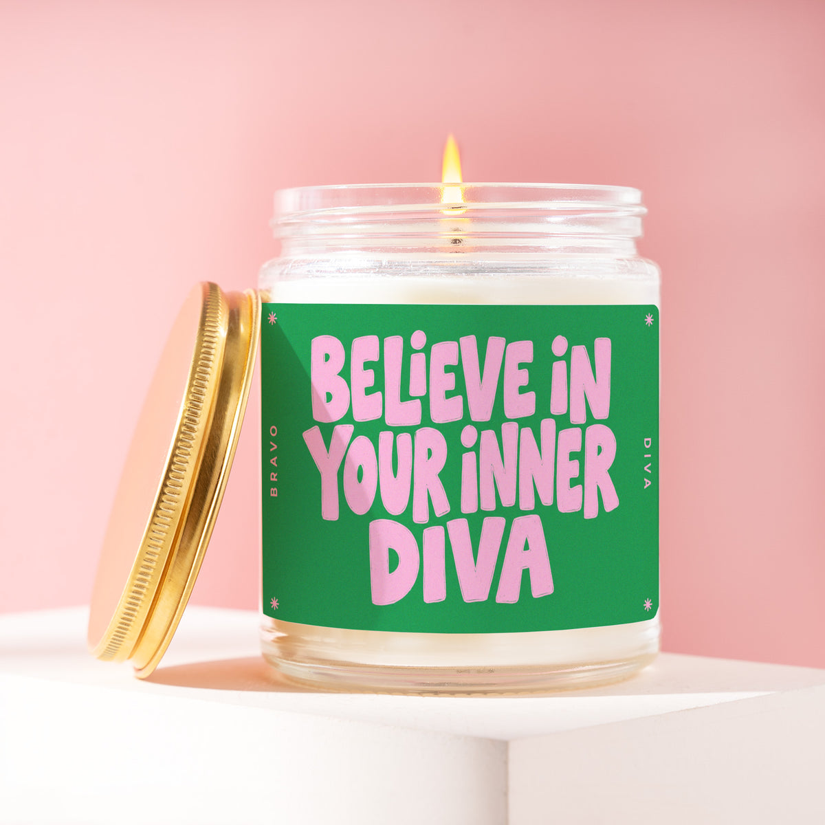 Believe In Your Inner Diva 9 oz soy candle with a brushed gold lid by James Wax