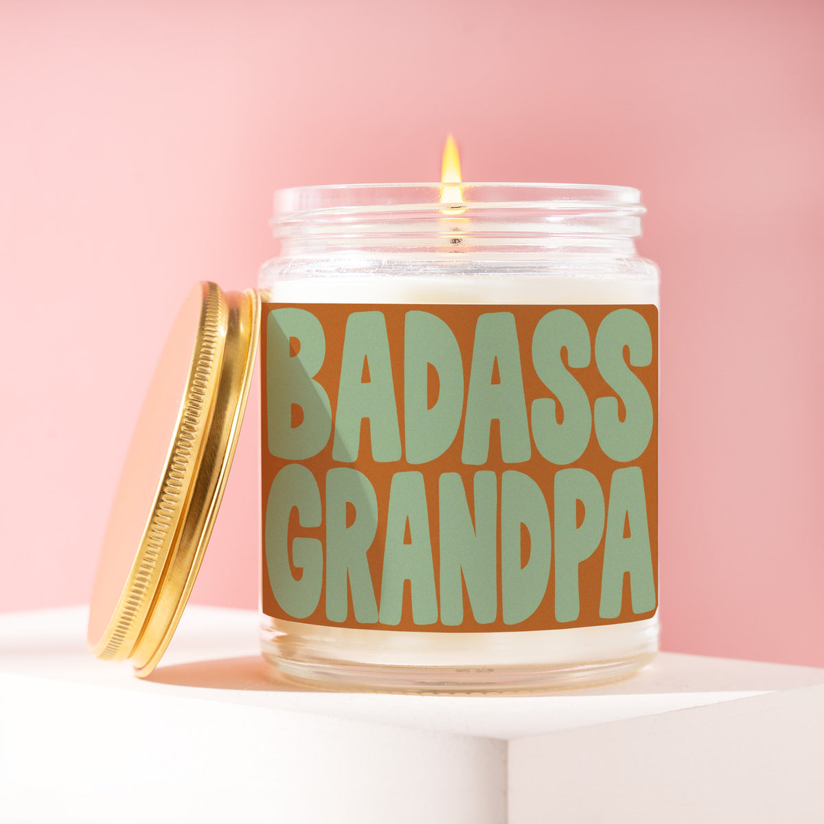 Badass Grandpa 9 oz soy candle with a brushed gold lid by James Wax
