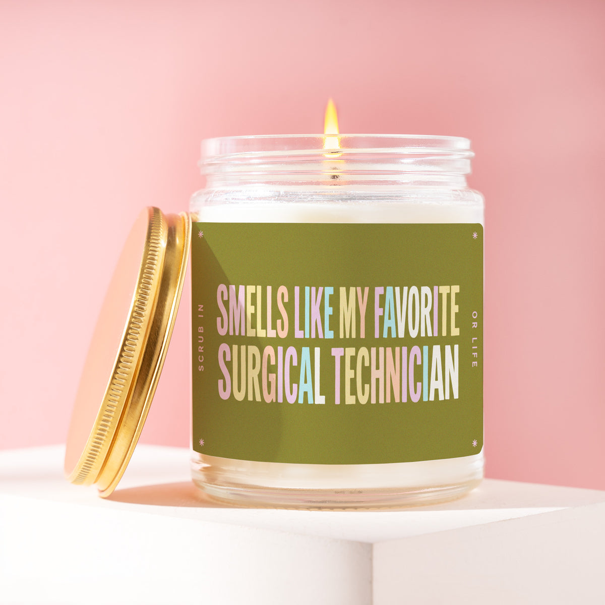 Smells Like My Favorite Surgical Technician 9 oz soy candle with a brushed gold lid by James Wax