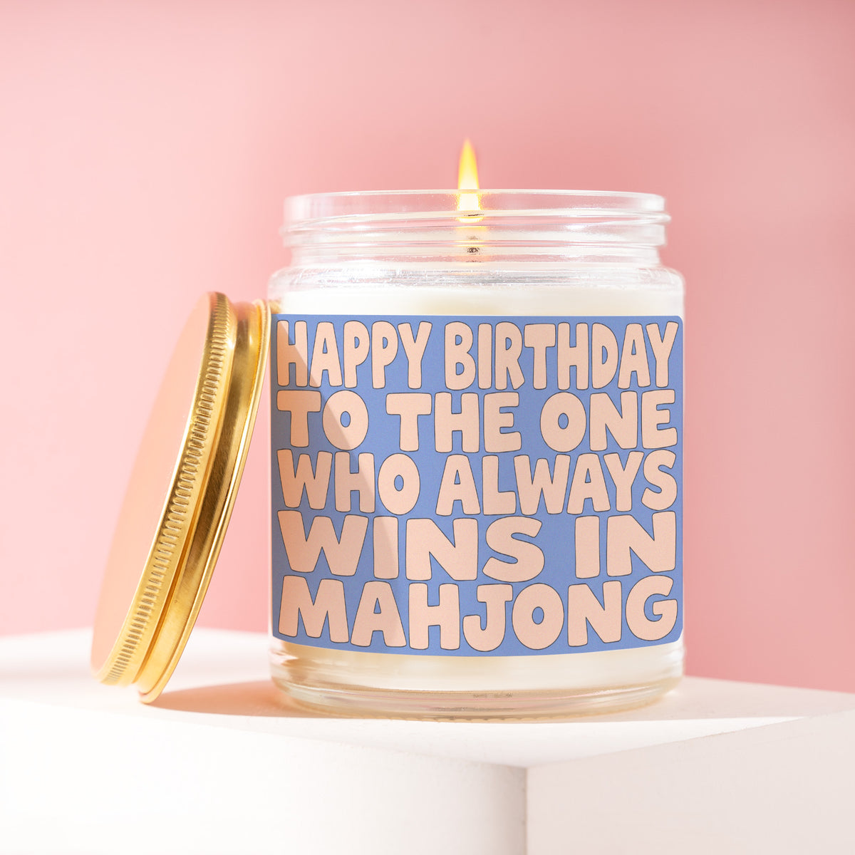Happy Birthday To The One Who Always Wins In Mahjong 9 oz soy candle with a brushed gold lid by James Wax
