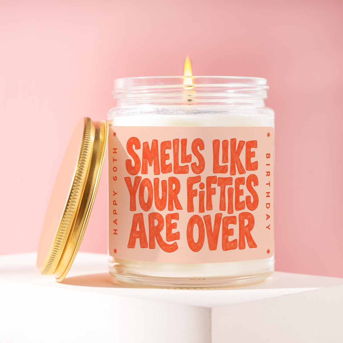 Smells Like Your Fifties Are Over 9 oz soy candle with a brushed gold lid by James Wax