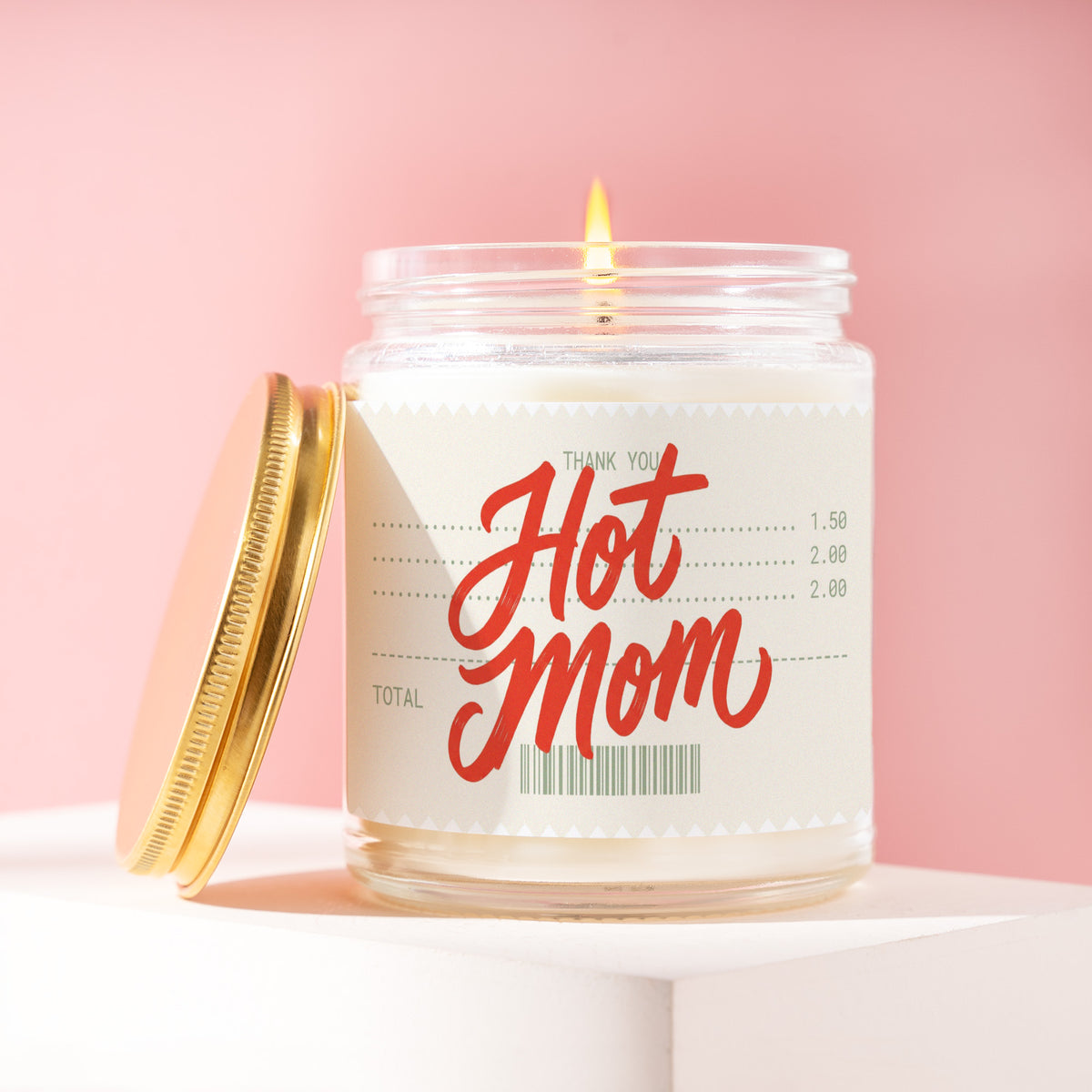 Hot Mom 9 oz soy candle with a brushed gold lid by James Wax