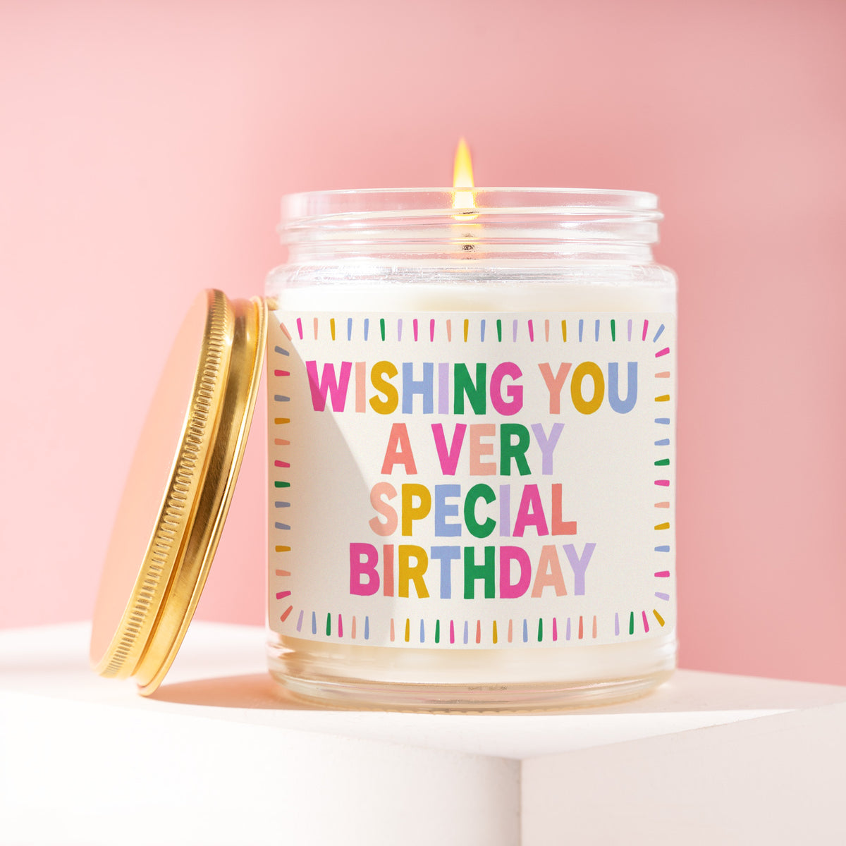 Wishing You A Very Special Birthday 9 oz soy candle with a brushed gold lid by James Wax