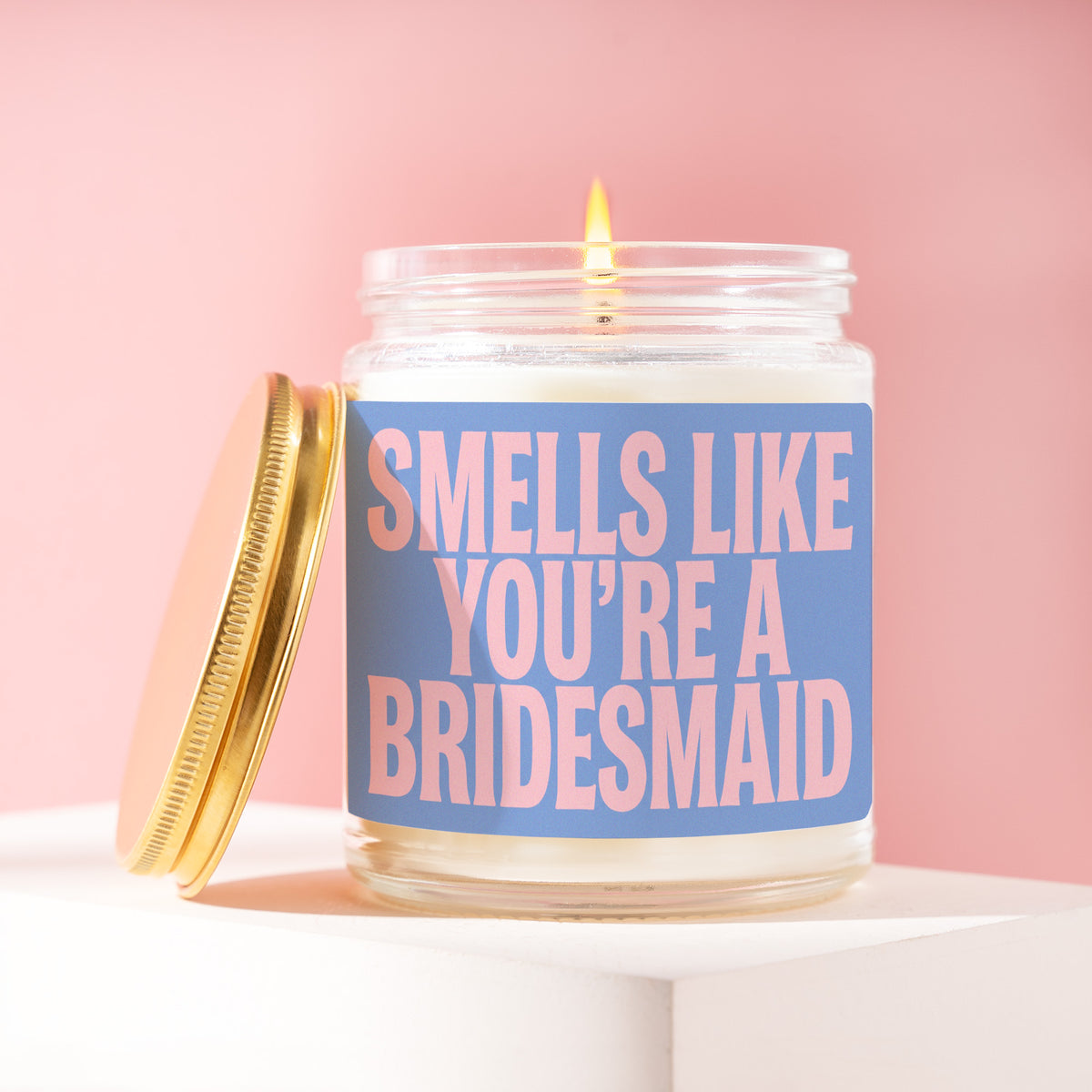 Smells Like You're A Bridesmaid 9 oz soy candle with a brushed gold lid by James Wax