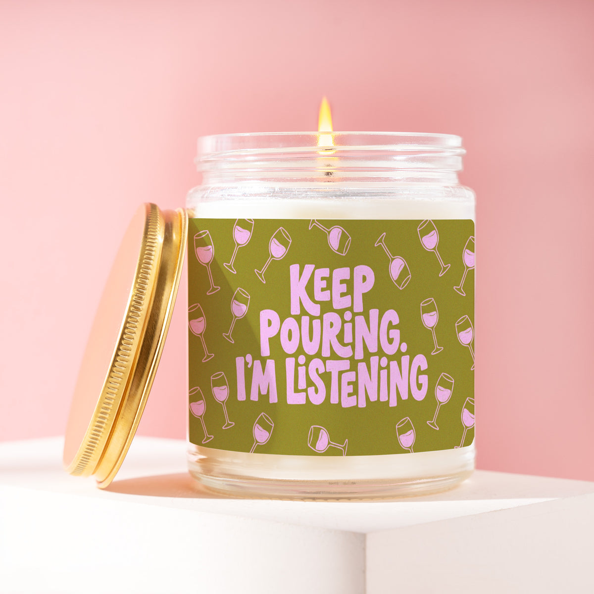 Keep Pouring. I'm Listening. 9 oz soy candle with a brushed gold lid by James Wax