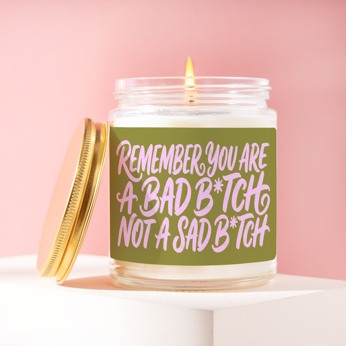 Remember You Are A Bad B*tch Not A Sad B*tch 9 oz soy candle with a brushed gold lid by James Wax