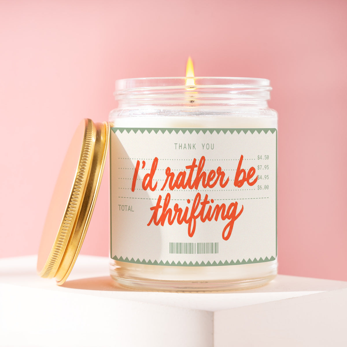 I'd Rather Be Thrifting 9 oz soy candle with a brushed gold lid by James Wax