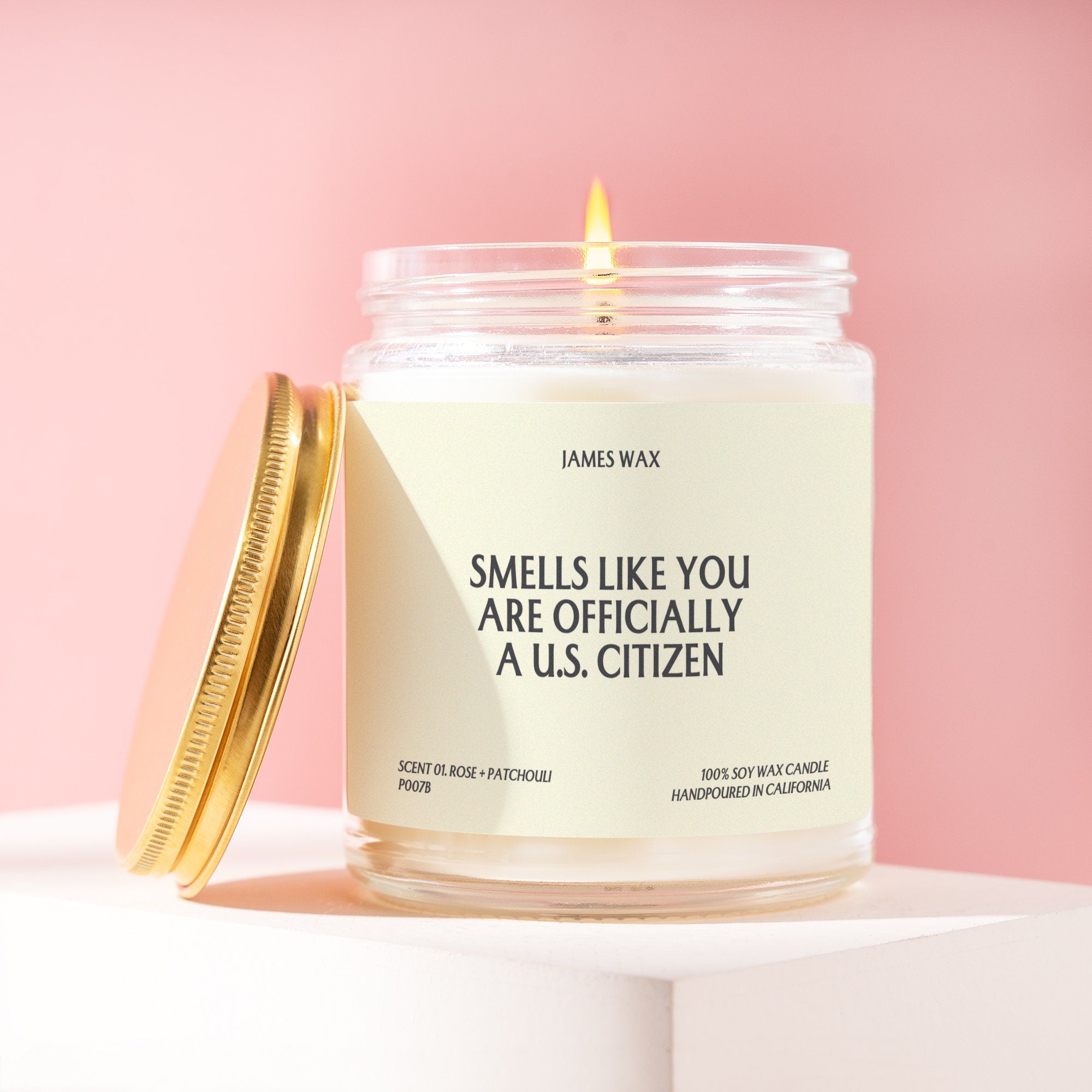 a jar of candles that says smells like you are officially a us citizen