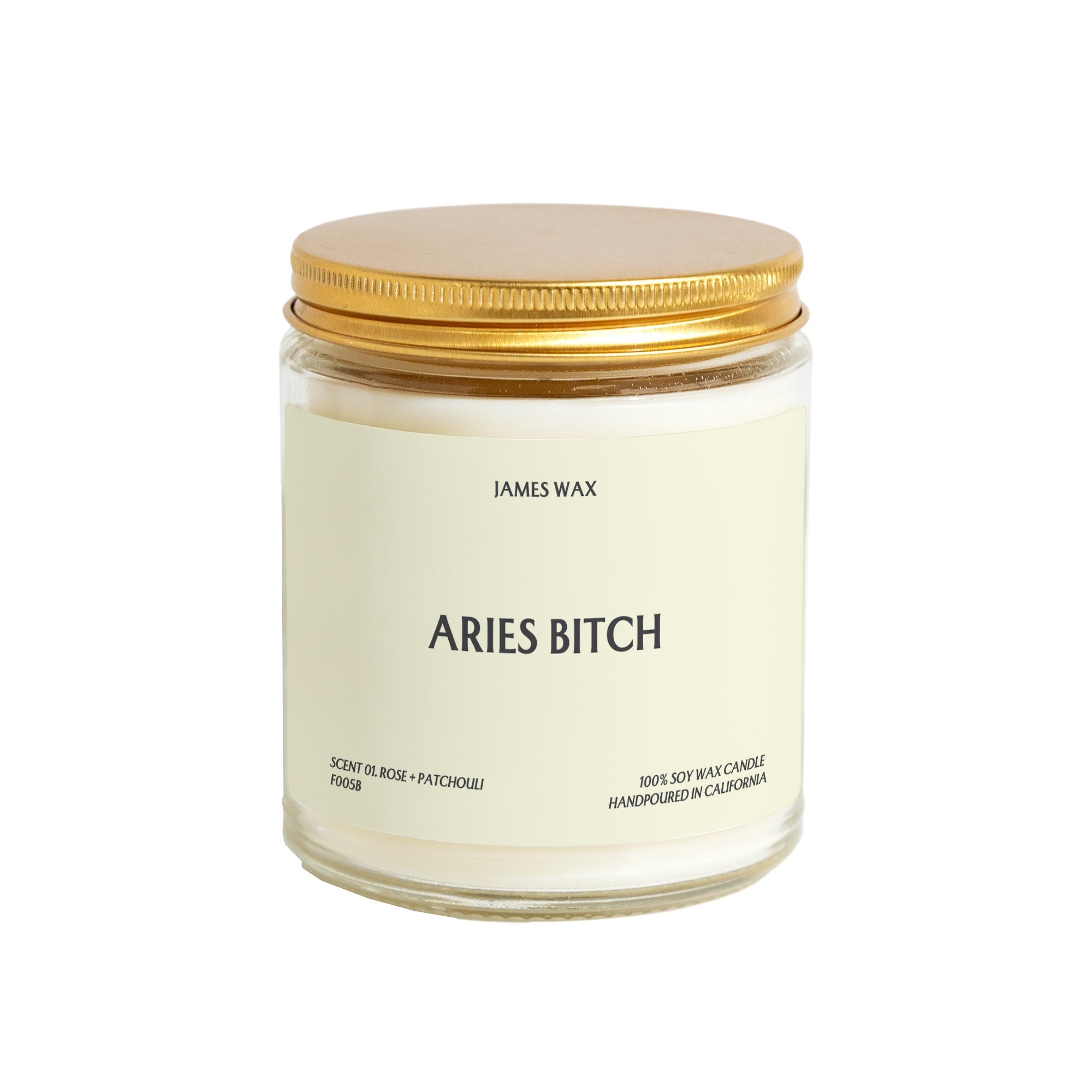 a jar of aries bitch with a gold lid