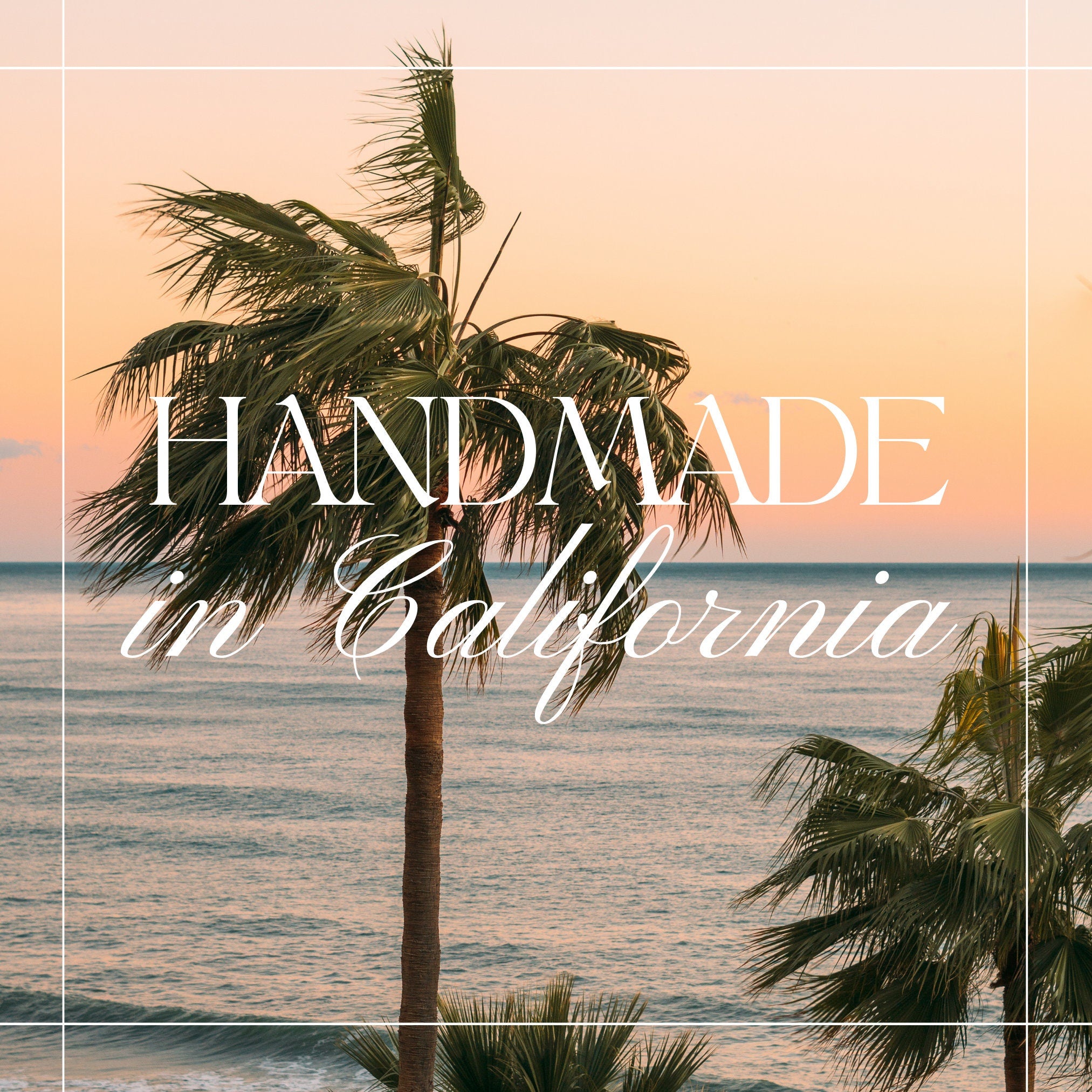 a palm tree in front of the ocean with the words handmade in california