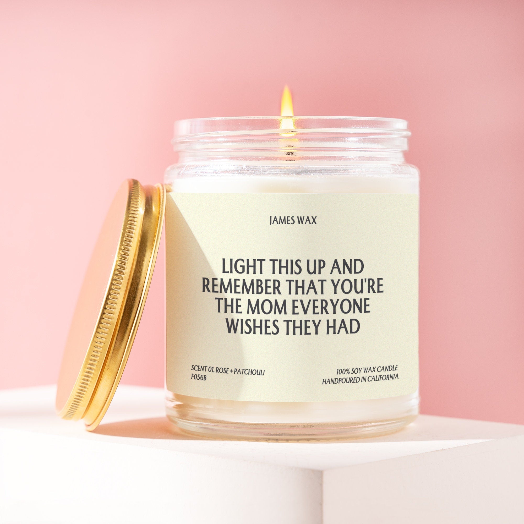 a jar of candles with a quote on it